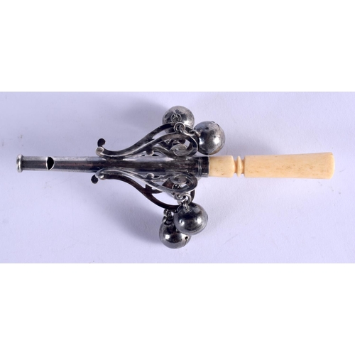 972 - A VICTORIAN SILVER AND IVORY BABIES RATTLE. 13 cm long.