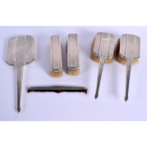 809 - AN ART DECO SILVER DRESSING TABLE SET. Birmingham 1933. 705 grams overall. (6)