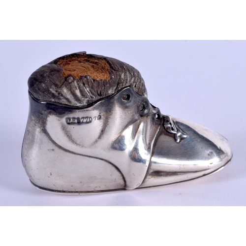 992 - AN ANTIQUE SILVER BOOT PIN CUSHION. Birmingham. 57 grams. 4.5 cm x 7 cm.