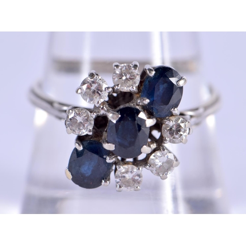 817 - AN ART DECO WHITE GOLD DIAMOND AND SAPPHIRE RING. Q. 5 grams.