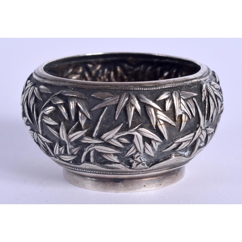 821 - A 19TH CENTURY CHINESE EXPORT SILVER SALT by Luen Hing, decorated with flowering plants. 27 grams. 4... 