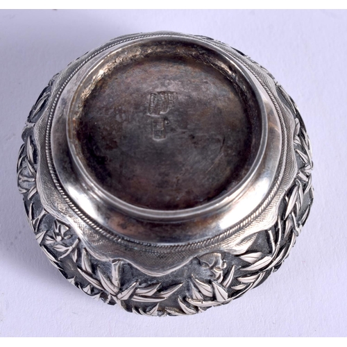 821 - A 19TH CENTURY CHINESE EXPORT SILVER SALT by Luen Hing, decorated with flowering plants. 27 grams. 4... 