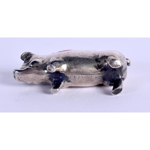 822 - AN ANTIQUE SILVER PLATED PIG PIN CUSHION. 33 grams. 4 cm wide.