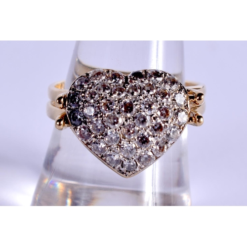 823 - A 14CT GOLD AND DIAMOND SWIVEL HEART RING. 8 grams. S.