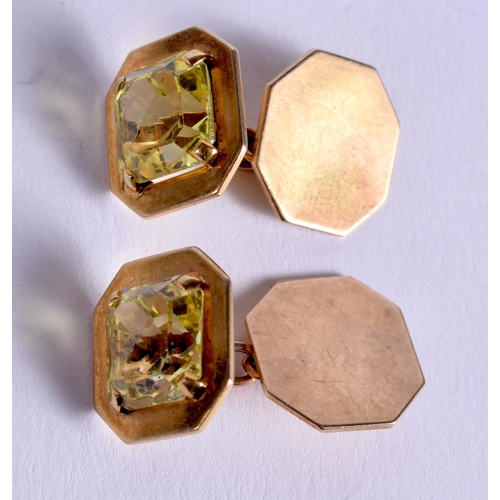 824 - A PAIR OF ART DECO GOLD AND YELLOW STONE CUFFLINKS possibly Yellow Sapphires. 9 grams. 1.5 cm x 1.3 ... 