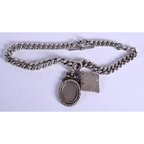 825 - AN ANTIQUE SILVER WATCH CHAIN. 103 grams. Birmingham 1881 & 1915. Largest pendant 4 cm x 2.5 cm.