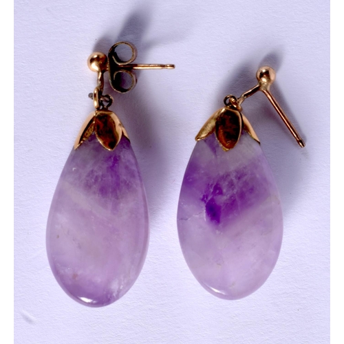 840 - A PAIR OF VINTAGE YELLOW METAL AND AMETHYST EARRINGS. 11 grams. 2.5 cm x 1.5 cm.