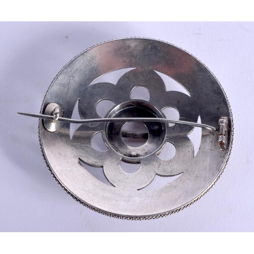 844 - AN ANTIQUE BRIGHT CUT STEEL BROOCH. 35 grams. 5 cm diameter.