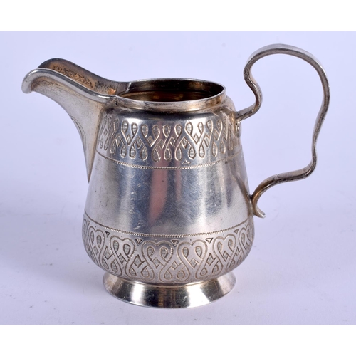 855 - AN ANTIQUE RUSSIAN SILVER CREAM JUG. 105 grams. 10 cm x 8 cm.