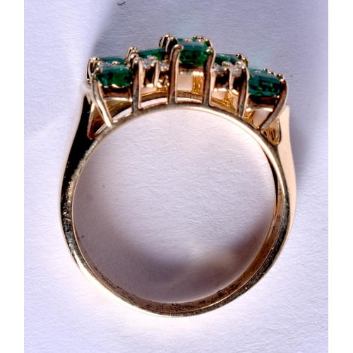 858 - A 14CT GOLD DIAMOND AND EMERALD RING. O/P. 6 grams.