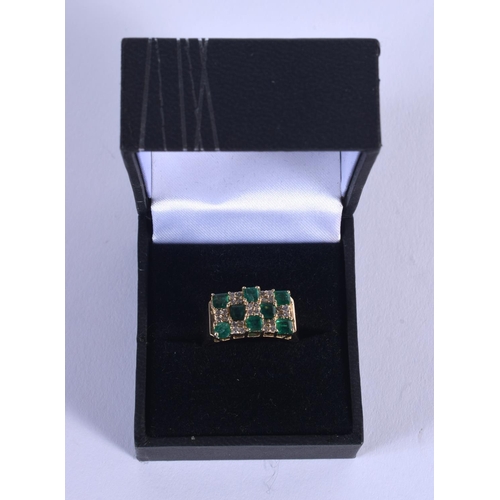 858 - A 14CT GOLD DIAMOND AND EMERALD RING. O/P. 6 grams.