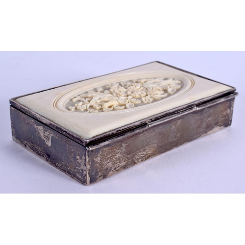 875 - AN ANTIQUE CONTINENTAL IVORY AND SILVER SNUFF BOX. 125 grams. 10 cm x 7 cm.