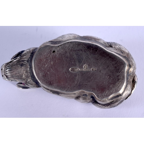 881 - A CONTINENTAL SILVER RUBY EYED FIGURE OF A PIG. 41 grams. 6 cm x 4 cm.