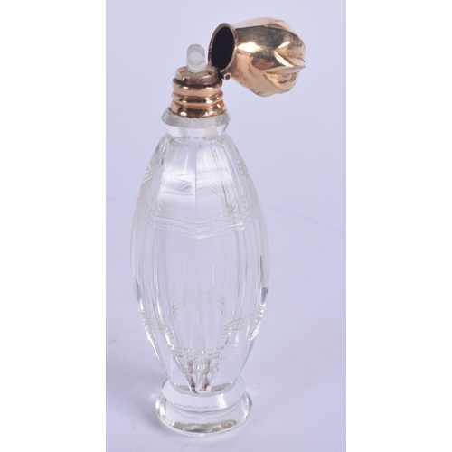 892 - A FRENCH 18CT GOLD AND CRYSTAL SCENT BOTTLE. 9.5 cm high.