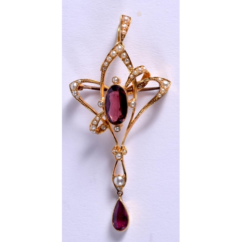 896 - AN ART NOUVEAU 15CT GOLD PEARL GARNET BROOCH. 5 grams. 4 cm x 3 cm.