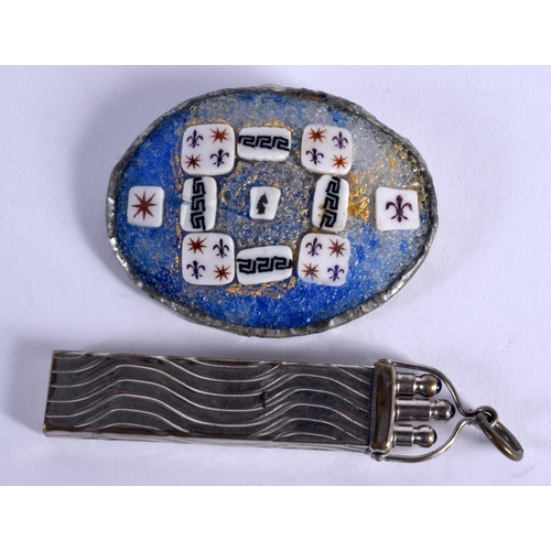 897 - A SOUTHERN EUROPEAN SILVER MOUNTED BROOCH and a pen holder. (2)