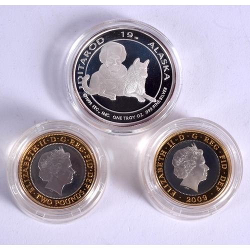 927 - THREE BOXED SILVER PROOF COINS. (3)