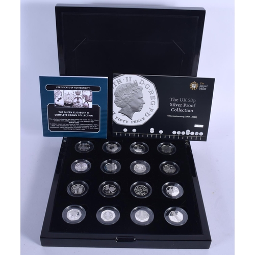 930 - A BOXED SET OF SILVER FIFTY PENCE PROOF COINS. (qty)