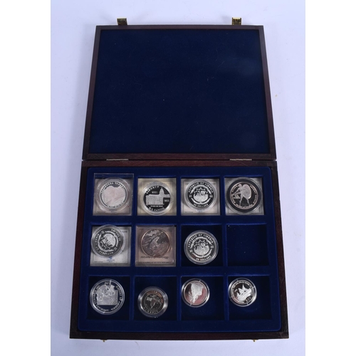 931 - ELEVEN BOXED SILVER PROOF COINS. (11)