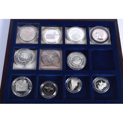 931 - ELEVEN BOXED SILVER PROOF COINS. (11)