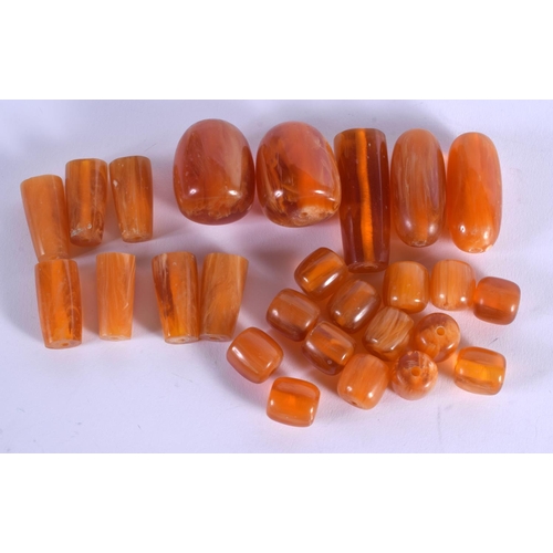 937 - ASSORTED VINTAGE AMBER TOGGLES. 104 grams. (qty)