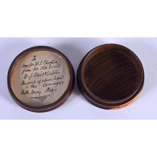 946 - AN ANTIQUE TREEN HORSE HEAD EQUESTRIAN SNUFF BOX. 7.5 cm diameter.