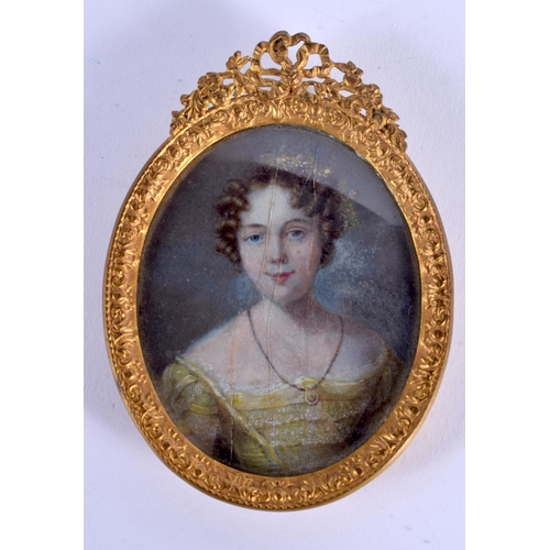 948 - AN ANTIQUE PAINTED IVORY PORTRAIT MINIATURE painted with a female. Image 6.5 cm x 4.5 cm.