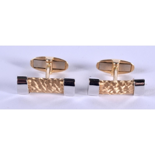 953 - A PAIR OF TWO TONE 14CT GOLD CUFFLINKS. 10.8 grams.