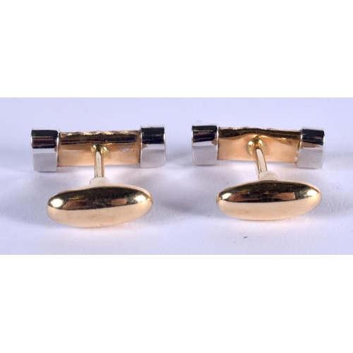 953 - A PAIR OF TWO TONE 14CT GOLD CUFFLINKS. 10.8 grams.