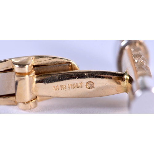 953 - A PAIR OF TWO TONE 14CT GOLD CUFFLINKS. 10.8 grams.