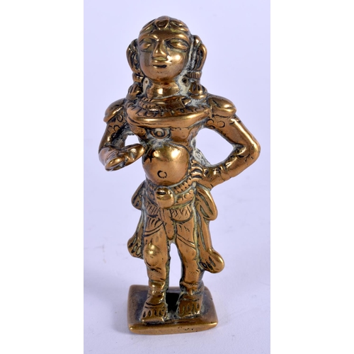 955 - AN 18TH/19TH CENTURY INDIAN BRONZE FIGURE OF A BUDDHISTIC DEITY. 8 cm high.