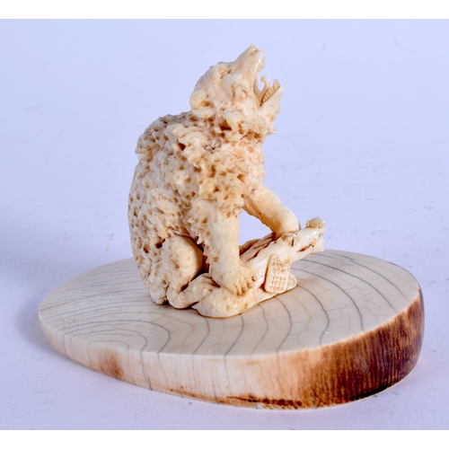 963 - A 19TH CENTURY EUROPEAN CARVED IVORY BEAR modelled with a honeycomb body. 9 cm x 7 cm.