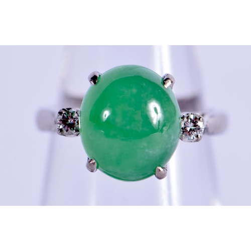 973 - A 14CT GOLD DIAMOND AND JADEITE RING. 6 grams. I/J.