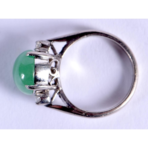 973 - A 14CT GOLD DIAMOND AND JADEITE RING. 6 grams. I/J.