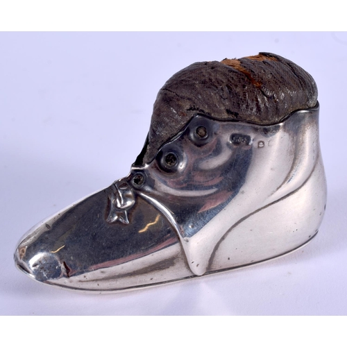 992 - AN ANTIQUE SILVER BOOT PIN CUSHION. Birmingham. 57 grams. 4.5 cm x 7 cm.