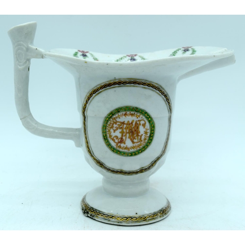 11 - AN 18TH CENTURY CHINESE EXPORT FAMILLE ROSE HELMET FORM JUG Qianlong, together with a Chinese vase &... 