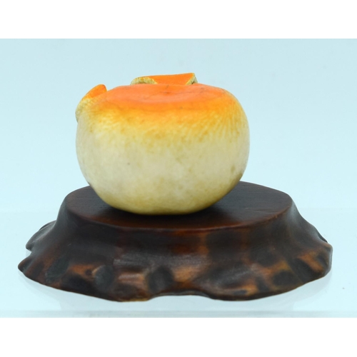 12 - A 19TH CENTURY JAPANESE MEIJI PERIOD CARVED IVORY OKIMONO modelled as peeled tangerine. Okimono 5 cm... 