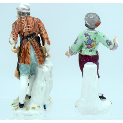 13 - A 19TH CENTURY GERMAN SITZENDORF PORCELAIN FIGURE OF A MALE WITH WHEELBARROW together with another s... 