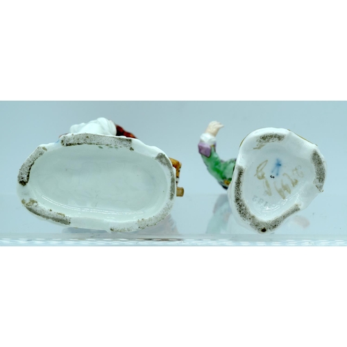 13 - A 19TH CENTURY GERMAN SITZENDORF PORCELAIN FIGURE OF A MALE WITH WHEELBARROW together with another s... 