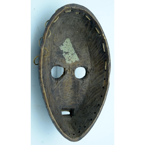 16 - AFRICAN TRIBAL DAN GUHYELEY MASK, IVORY COAST.  23cm x 13cm