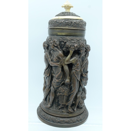 41 - A VICTORIAN ELECTROTYPE EMBOSSED TANKARD by Elkington, Mason & Co, oval, profusely decorated with cl... 