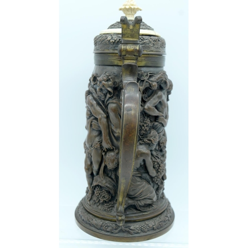 41 - A VICTORIAN ELECTROTYPE EMBOSSED TANKARD by Elkington, Mason & Co, oval, profusely decorated with cl... 