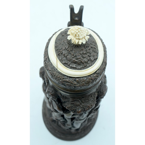 41 - A VICTORIAN ELECTROTYPE EMBOSSED TANKARD by Elkington, Mason & Co, oval, profusely decorated with cl... 