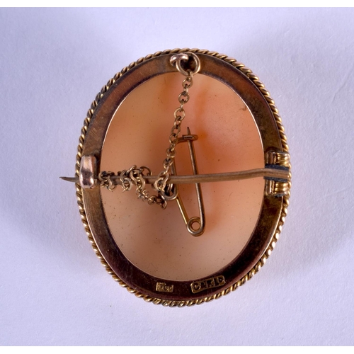 1001 - AN ANTIQUE 9CT GOLD MOUNTED CAMEO BROOCH. 7 grams. 3 cm x 2.5 cm.