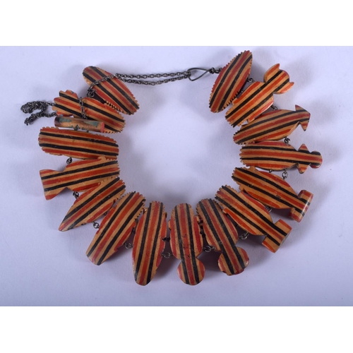 1018 - A VINTAGE CONTINENTAL CARVED AND PAINTED MASK WOOD NECKLACE. 28 cm long.