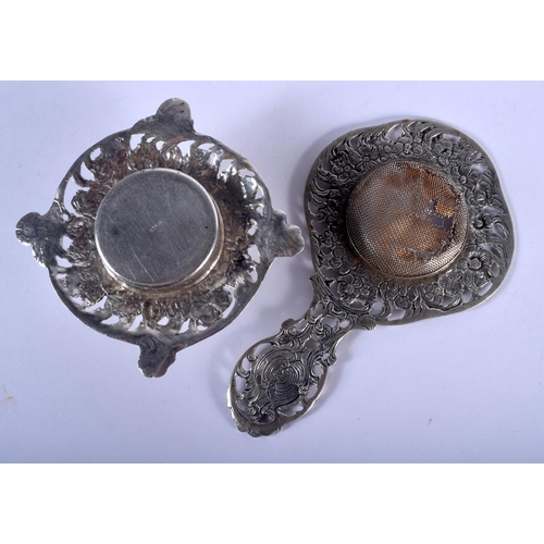 1032 - A 19TH CENTURY CONTINENTAL SILVER TEA STRAINER ON STAND. 87 grams. 12 cm x 7 cm. (2)