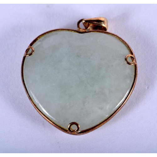 1033 - A 9CT GOLD JADEITE PENDANT. 7 grams. 2.5 cm x 2.5 cm.