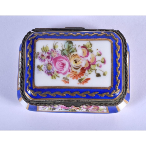 1049 - AN ANTIQUE CONTINENTAL PORCELAIN BOX painted with flowers. 6 cm x 4 cm.