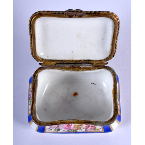 1049 - AN ANTIQUE CONTINENTAL PORCELAIN BOX painted with flowers. 6 cm x 4 cm.