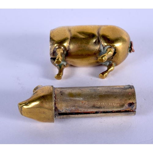 1053 - A RARE ANTIQUE BRASS PIGGY LIPSTICK HOLDER. 4.5 cm x 2 cm.